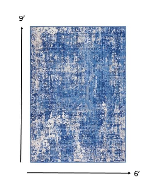 4’ X 6’ Blue And Ivory Abstract Splash Area Rug