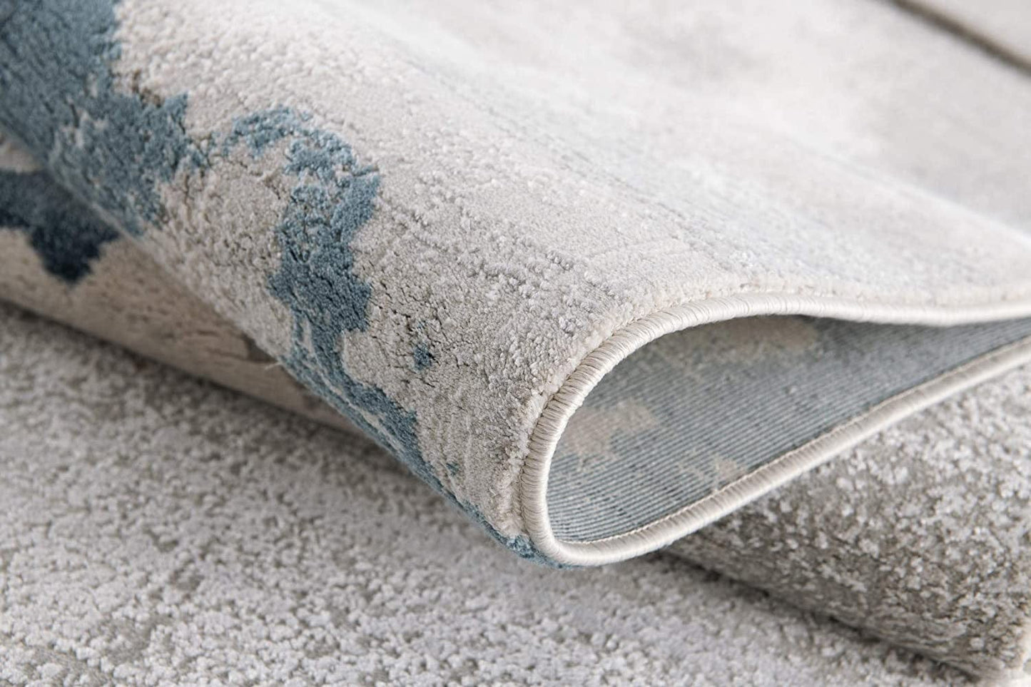 7’ X 10’ Gray And Blue Abstract Clouds Area Rug