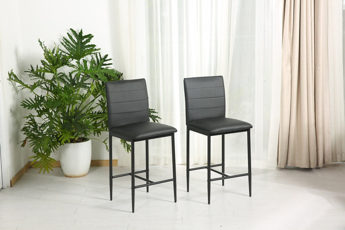 Set Of Two 40" Black Faux Leather And Steel Bar Chairs