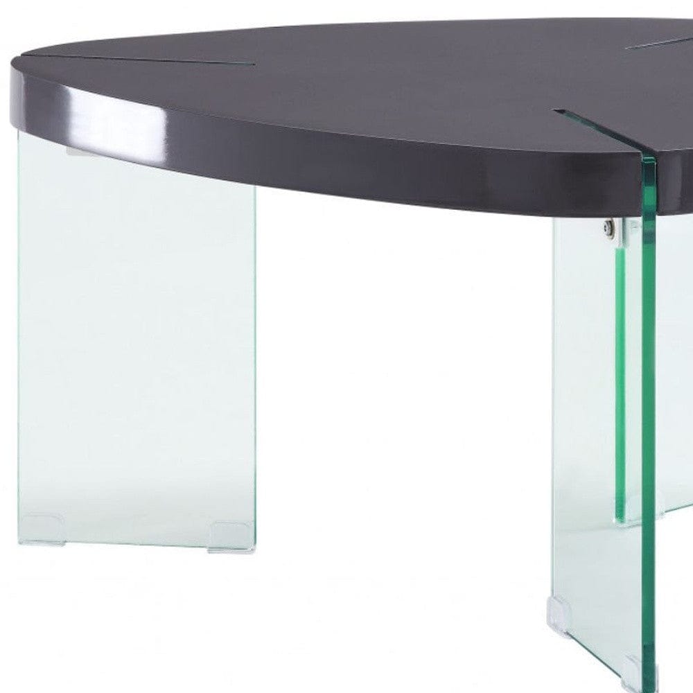 31" Clear Glass And Gray High Gloss Wood Triangle Coffee Table
