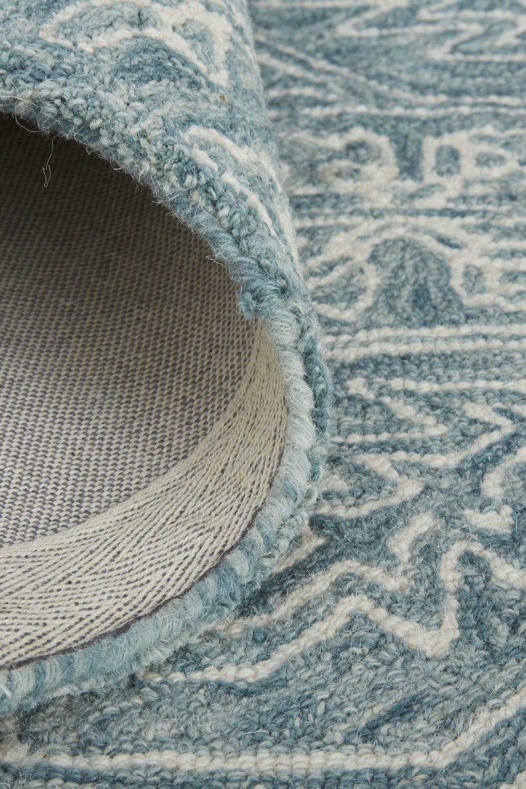 5' X 8' Ivory And Brown Wool Floral Tufted Handmade Stain Resistant Area Rug