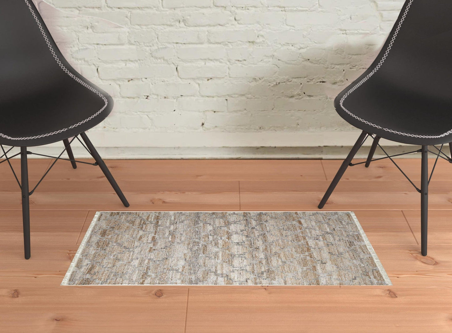 4' X 6' Tan Gray And Ivory Geometric Hand Woven Stain Resistant Area Rug With Fringe