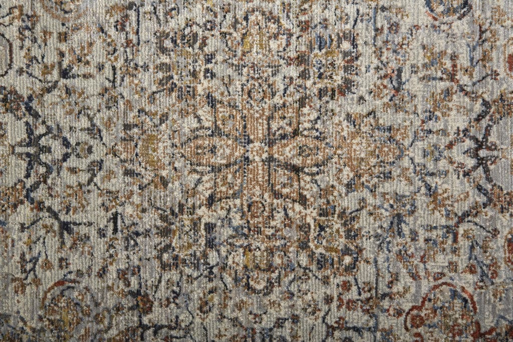5' X 8' Tan Orange And Blue Floral Power Loom Distressed Area Rug With Fringe