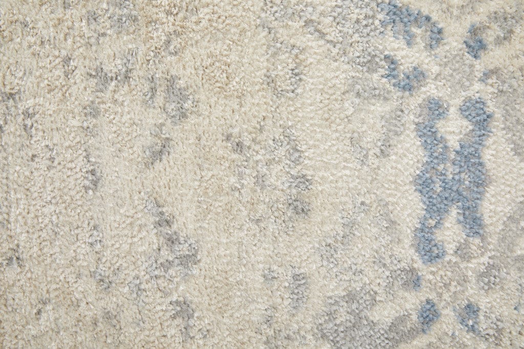 4' X 6' Blue And Ivory Power Loom Distressed Area Rug