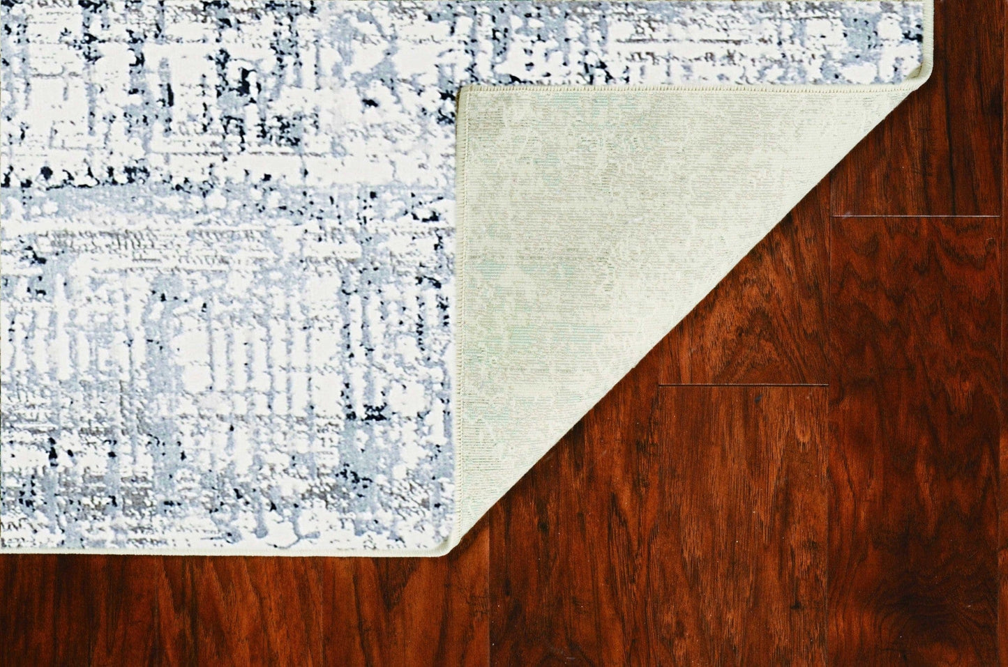 8'X11' Ivory Silver Machine Woven Abstract Scratch Indoor Area Rug