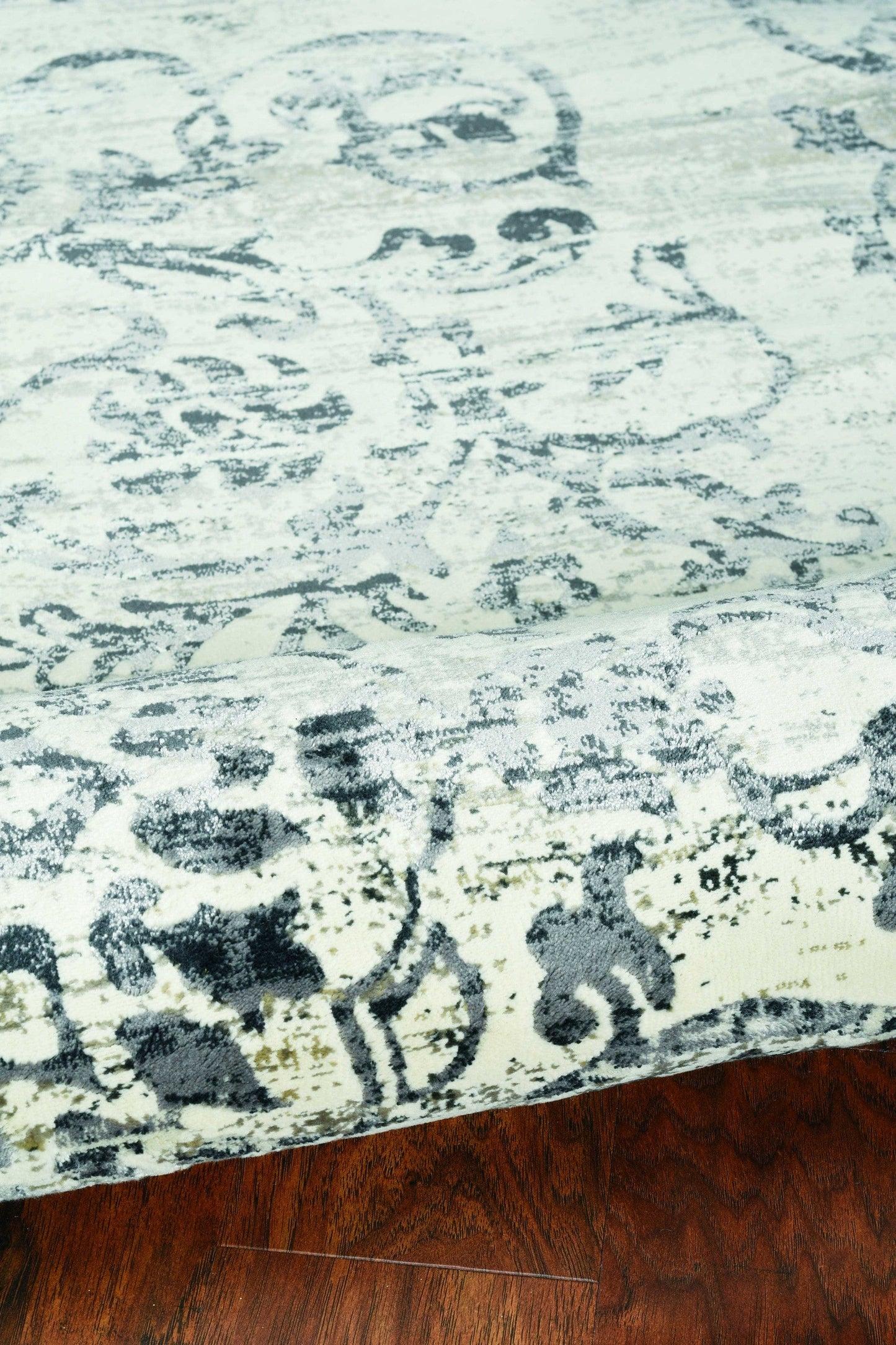 10'X13' Ivory Grey Machine Woven Distressed Floral Traditional Indoor Area Rug