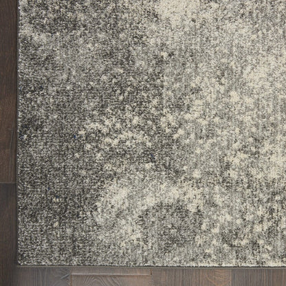 4’ X 6’ Charcoal And Ivory Abstract Area Rug