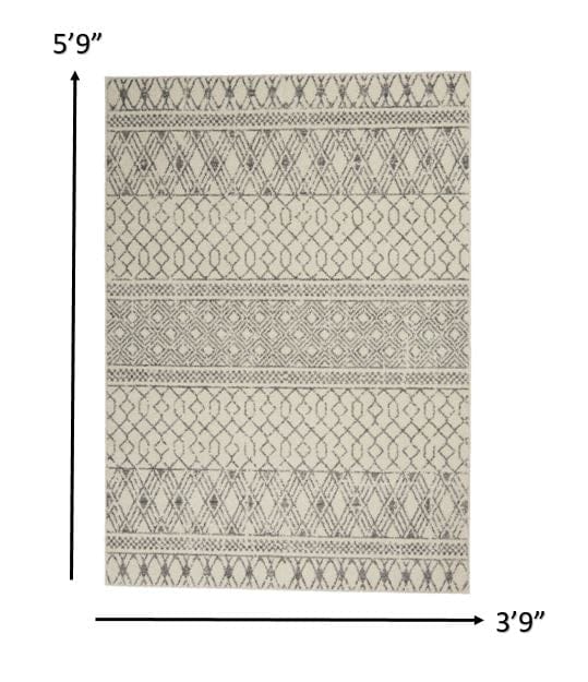 4’ X 6’ Ivory And Gray Geometric Area Rug