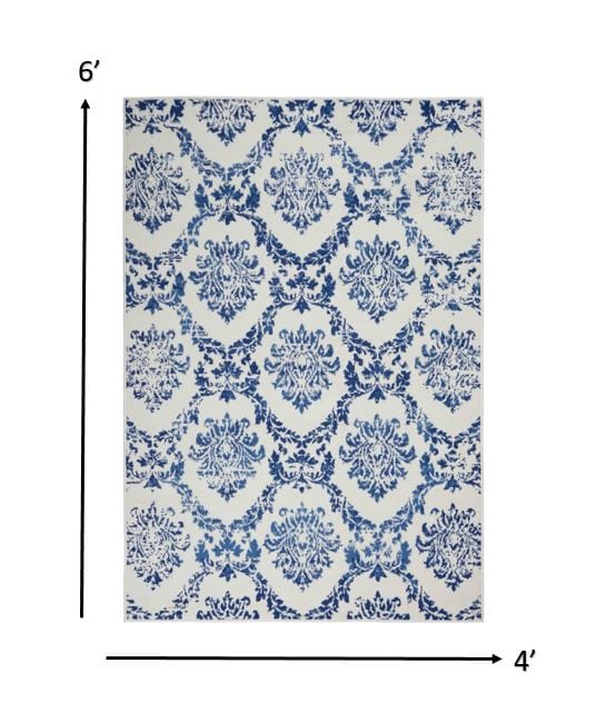 4’ X 6’ Blue And Ivory Damask Area Rug