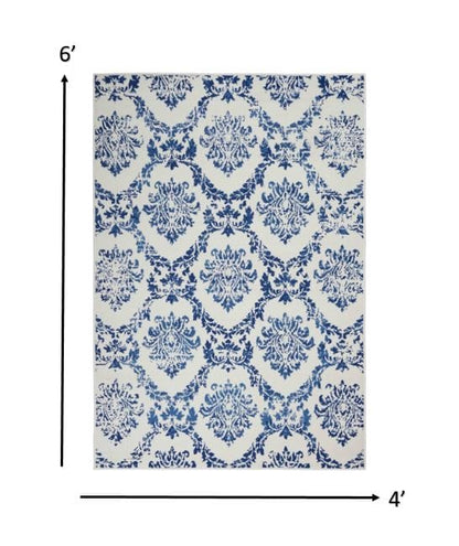 4’ X 6’ Blue And Ivory Damask Area Rug