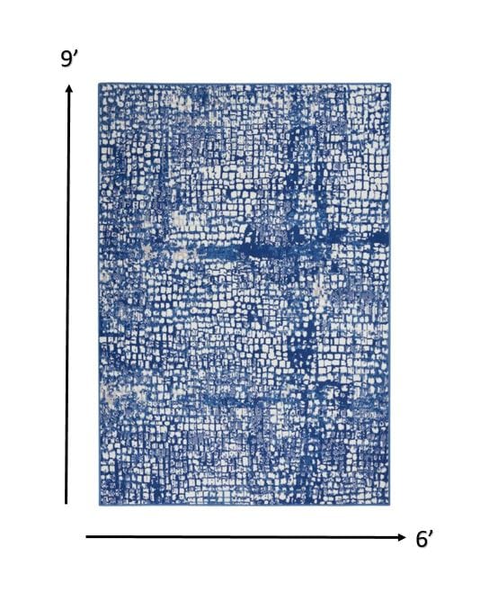 4’ X 6’ Ivory And Navy Abstract Grids Area Rug