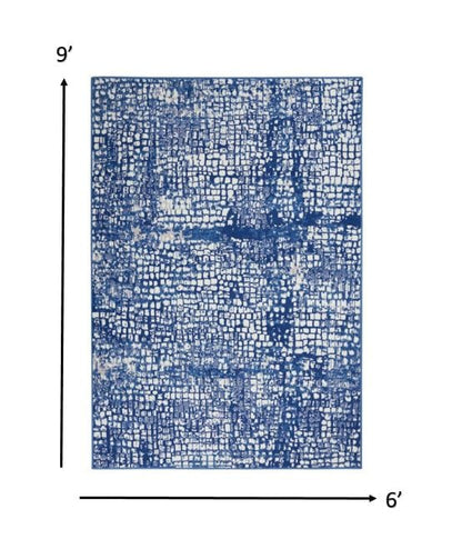 4’ X 6’ Ivory And Navy Abstract Grids Area Rug