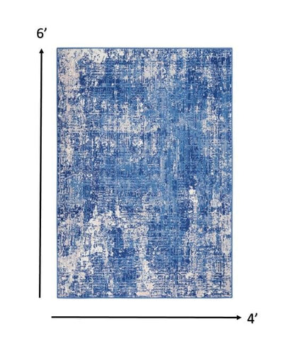 4’ X 6’ Blue And Ivory Abstract Splash Area Rug