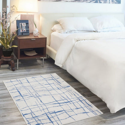 5’ X 7’ Ivory And Blue Irregular Grids Area Rug