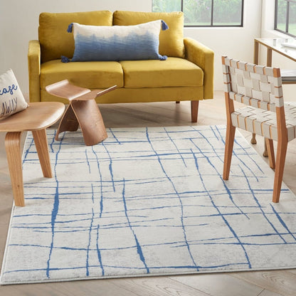 5’ X 7’ Ivory And Blue Irregular Grids Area Rug