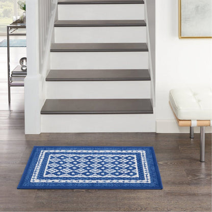 4’ X 6’ Navy And Ivory Geometric Area Rug