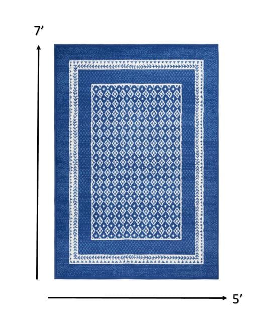 4’ X 6’ Navy And Ivory Geometric Area Rug