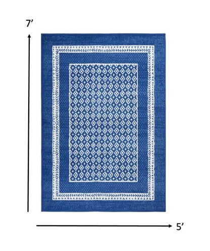 4’ X 6’ Navy And Ivory Geometric Area Rug