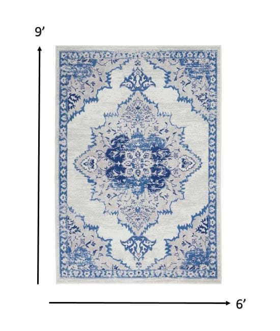 4’ X 6’ Ivory And Blue Medallion Area Rug