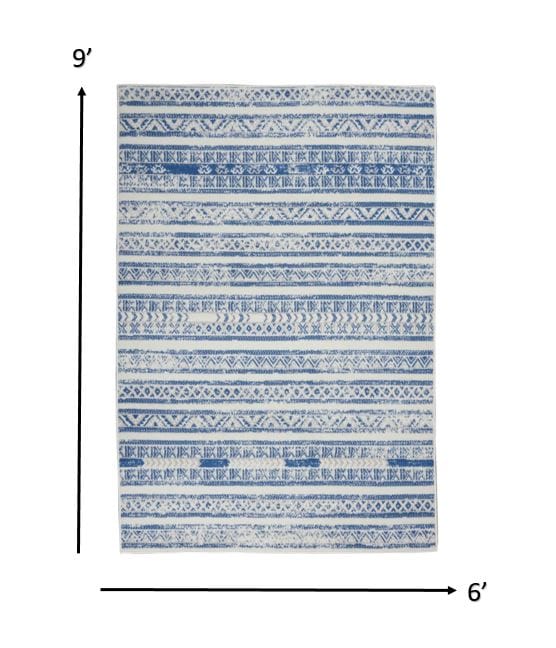 4’ X 6’ Ivory And Blue Distressed Area Rug