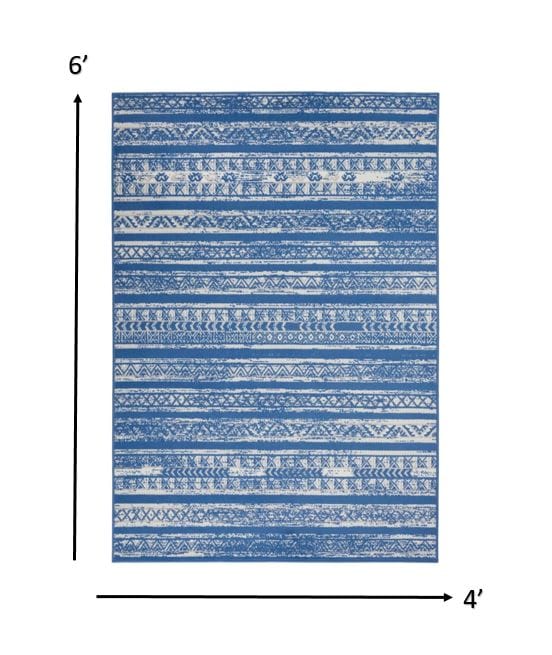 4’ X 6’ Ivory And Blue Distressed Area Rug