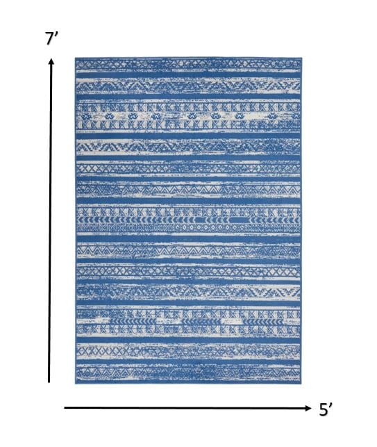 4’ X 6’ Ivory And Blue Distressed Area Rug