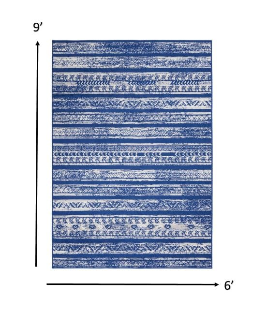 4’ X 6’ Ivory And Blue Distressed Area Rug