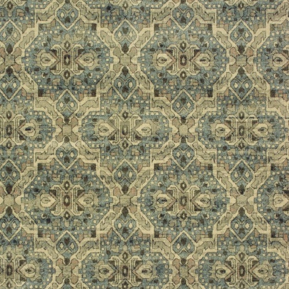 5’X8’ Ivory And Blue Geometric Area Rug