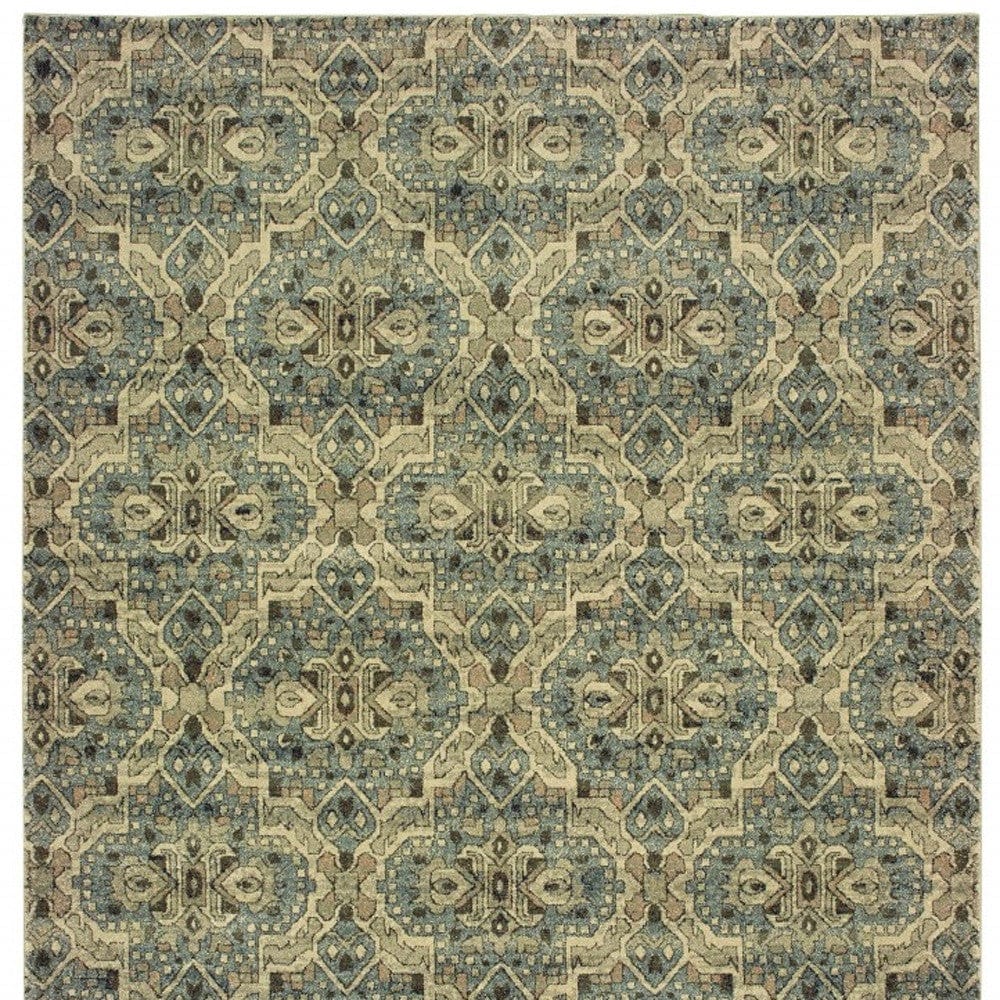5’X8’ Ivory And Blue Geometric Area Rug