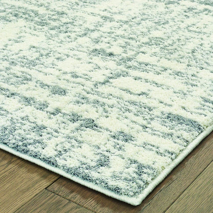 4’X6’ Ivory And Gray Abstract Strokes Area Rug