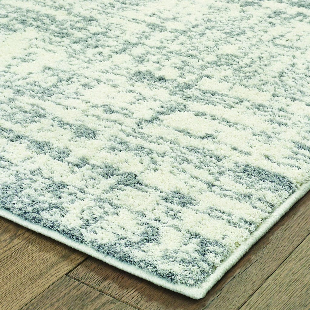 4’X6’ Ivory And Gray Abstract Strokes Area Rug