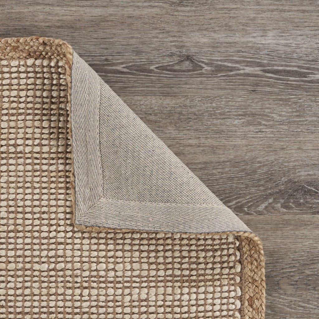 8’ x 10’ Tan and White Braid Border Area Rug