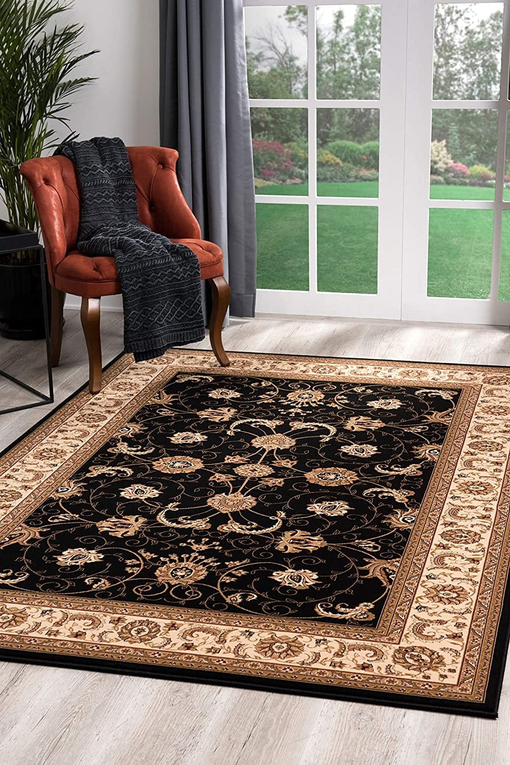 7’ x 9’ Black and Tan Floral Vines Area Rug