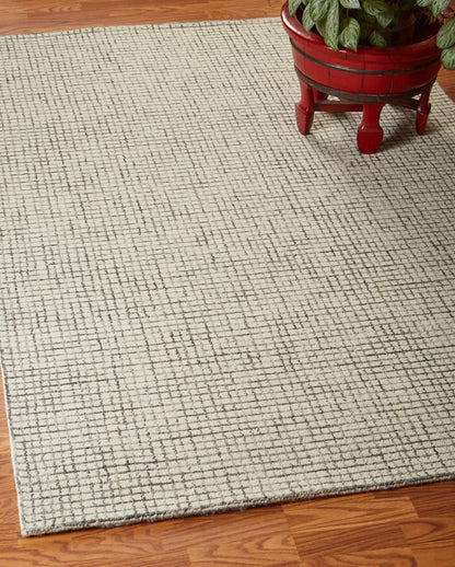5’ x 8’ Tan and Ivory Grid Area Rug