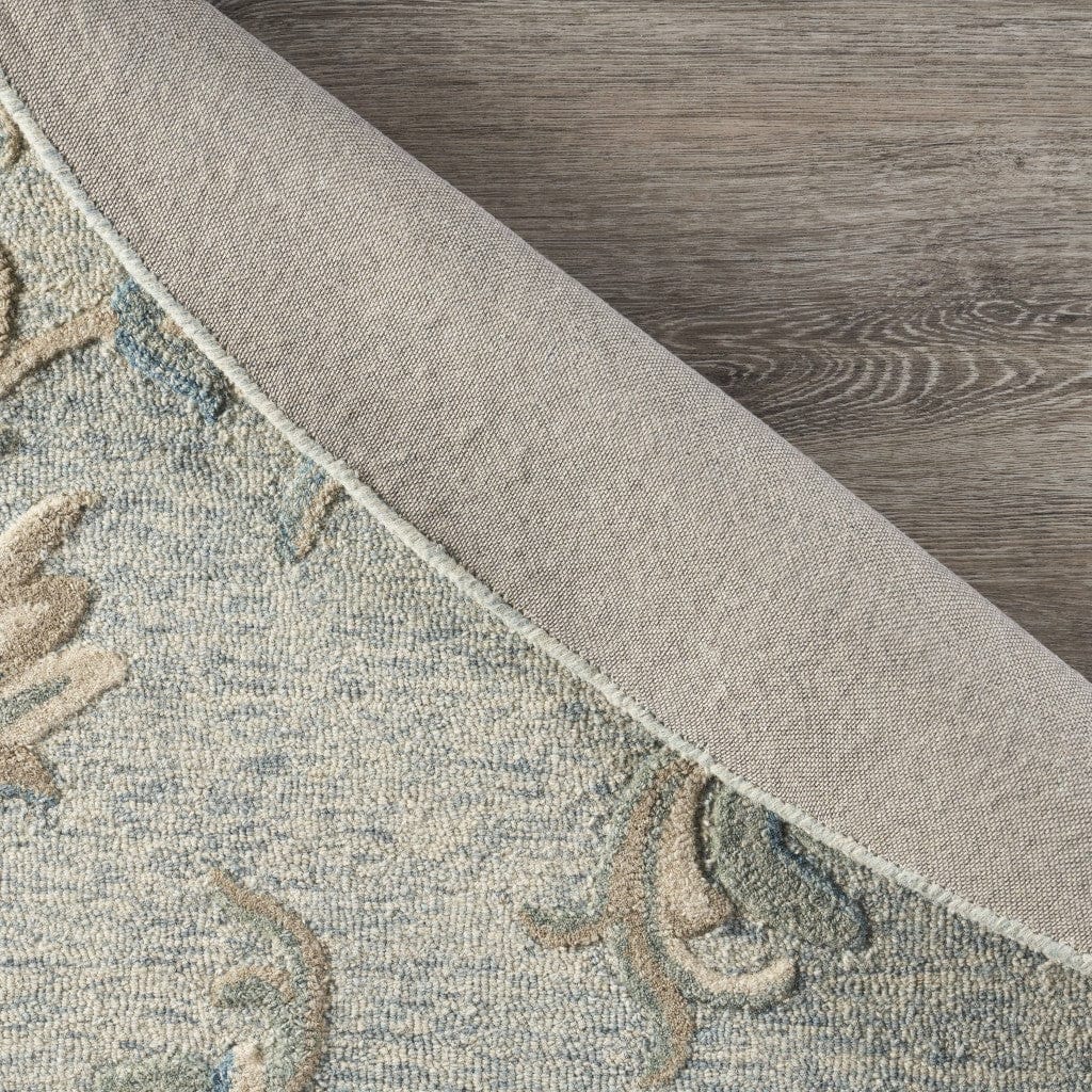 5’ Round Blue and Cream Filigree Area Rug