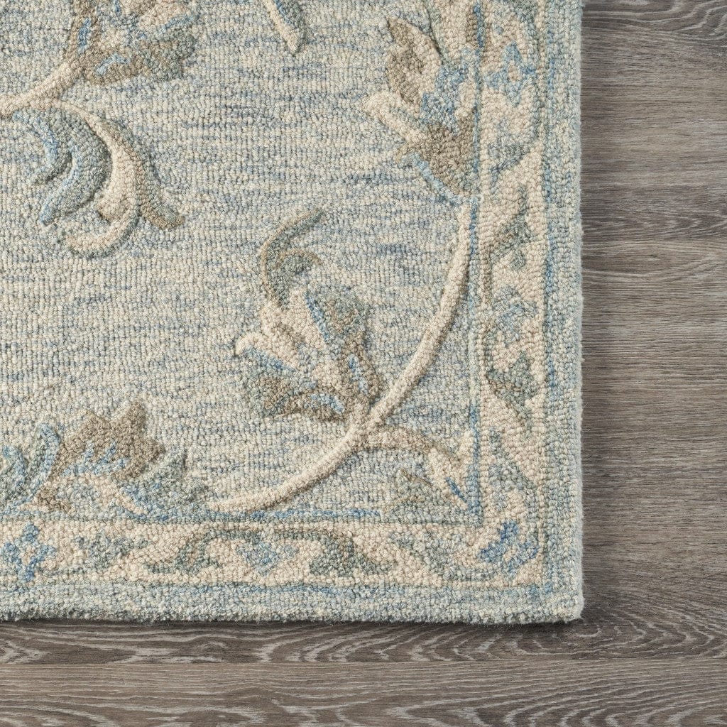 5’ Round Blue and Cream Filigree Area Rug