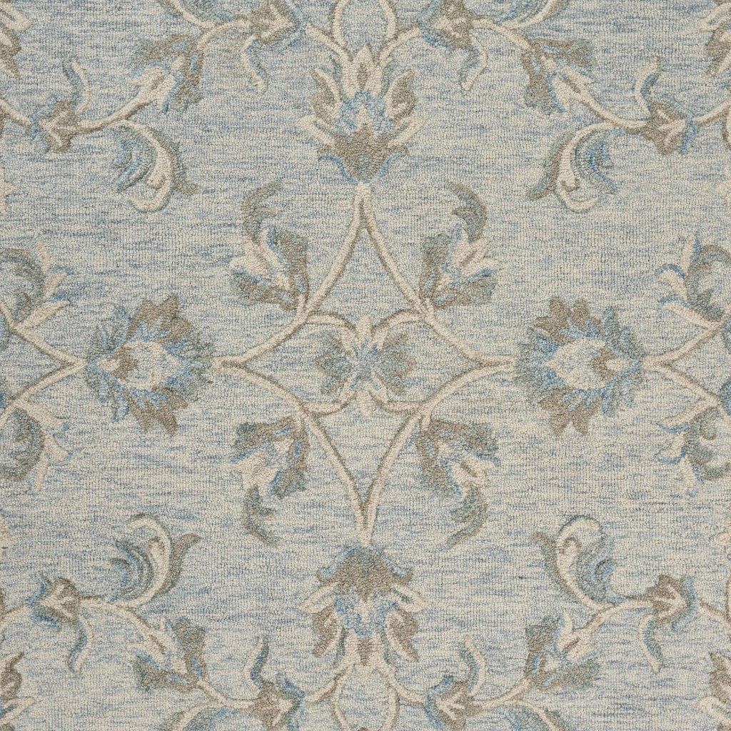 5’ Round Blue and Cream Filigree Area Rug