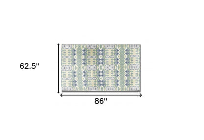 5' X 7' Light Green And Beige Oriental Area Rug