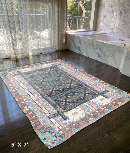 5' X 7' Dark Grey And Orange Oriental Area Rug