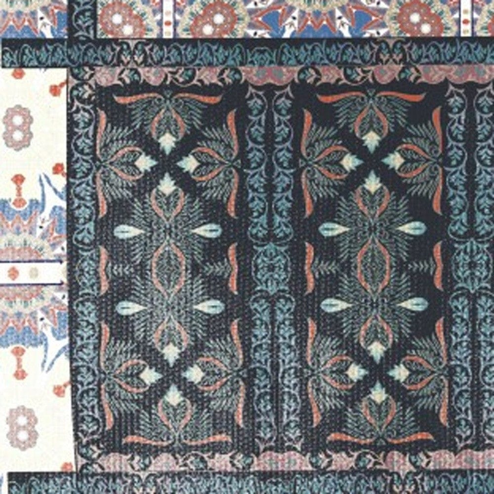 5' X 7' Dark Grey And Orange Oriental Area Rug