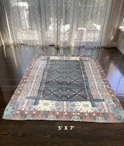 5' X 7' Dark Grey And Orange Oriental Area Rug