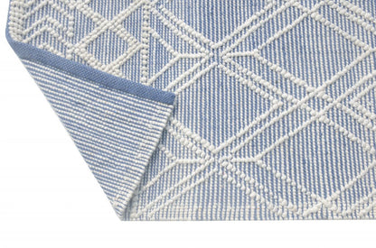 5’ x 7’ Blue Ivory Tribal Geometric Pattern Area Rug