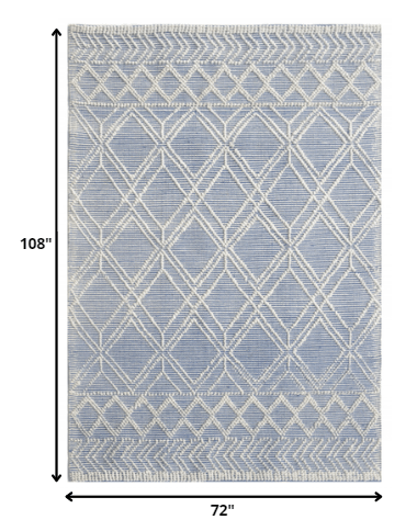 6’ x 9’ Blue Ivory Tribal Geometric Pattern Area Rug