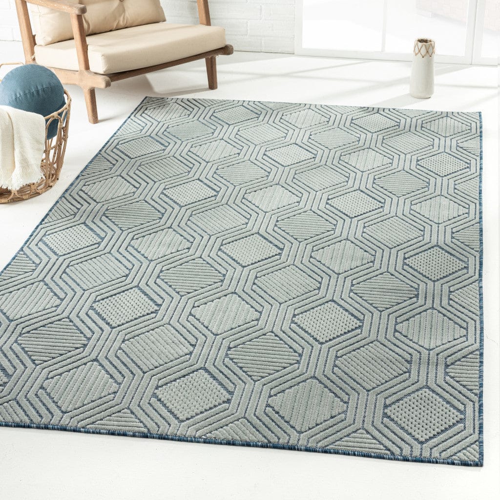 5' X 7' Light Blue And Navy Geometric Stain Resistant Area Rug