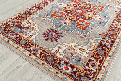 9' X 12' Blue And Maroon Geometric Stain Resistant Area Rug