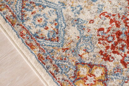 9' x12' Blue Red And Ivory Floral Power Loom Stain Resistant Area Rug