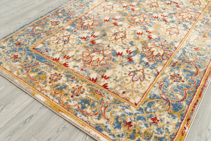 9' X 12' Yellow Blue And Ivory Floral Stain Resistant Area Rug