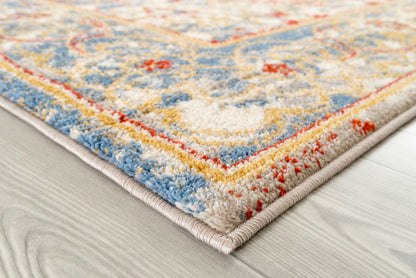 9' X 12' Yellow Blue And Ivory Floral Stain Resistant Area Rug