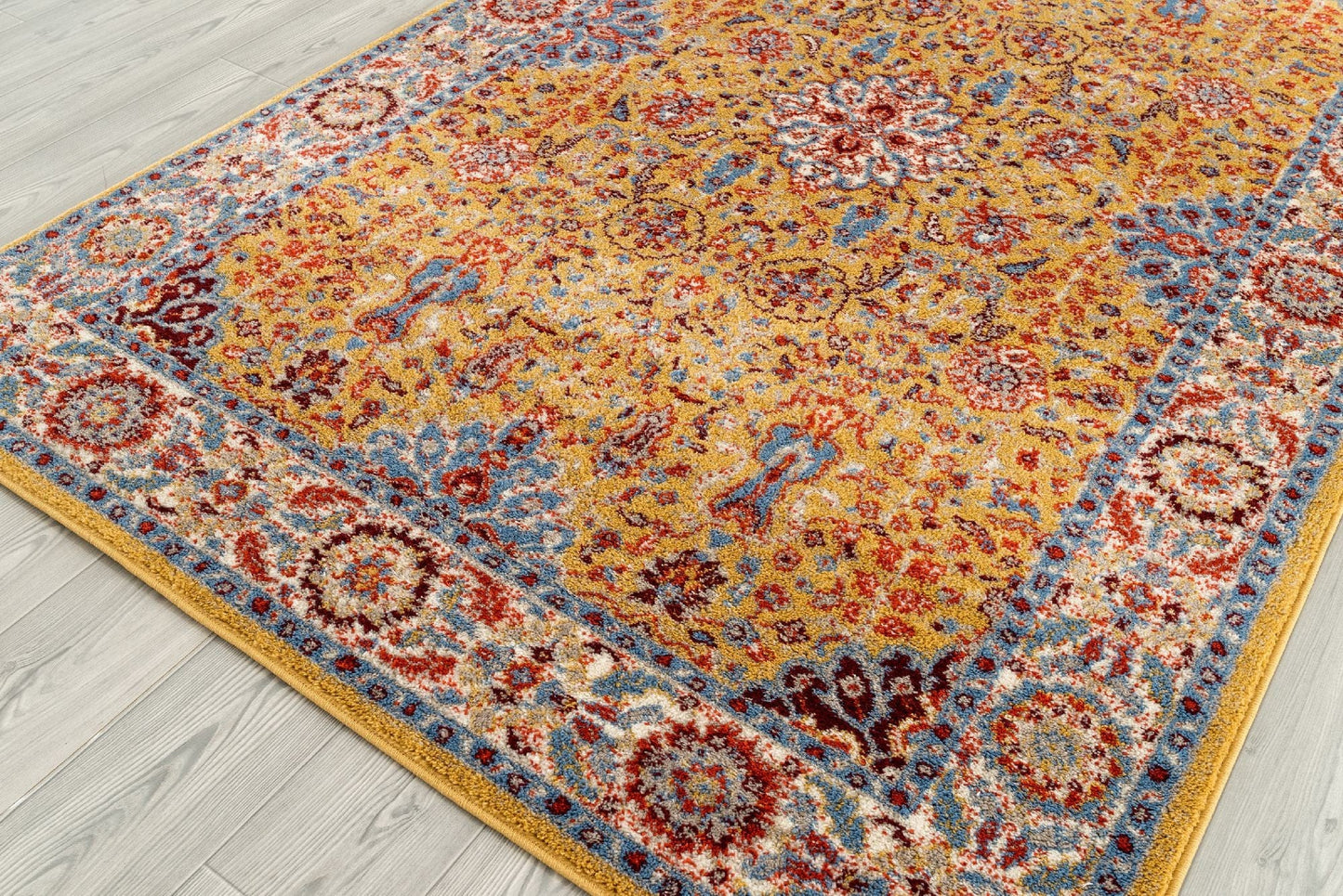 9' X 12' Blue Yellow And Ivory Oriental Power Loom Stain Resistant Area Rug