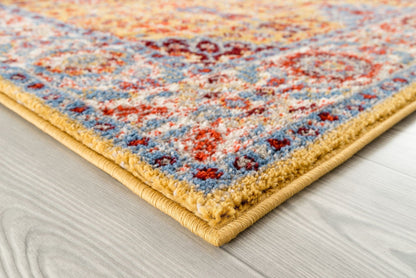 9' X 12' Blue Yellow And Ivory Oriental Power Loom Stain Resistant Area Rug